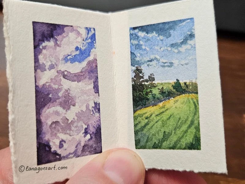 Miniature sketchbook in my hand.